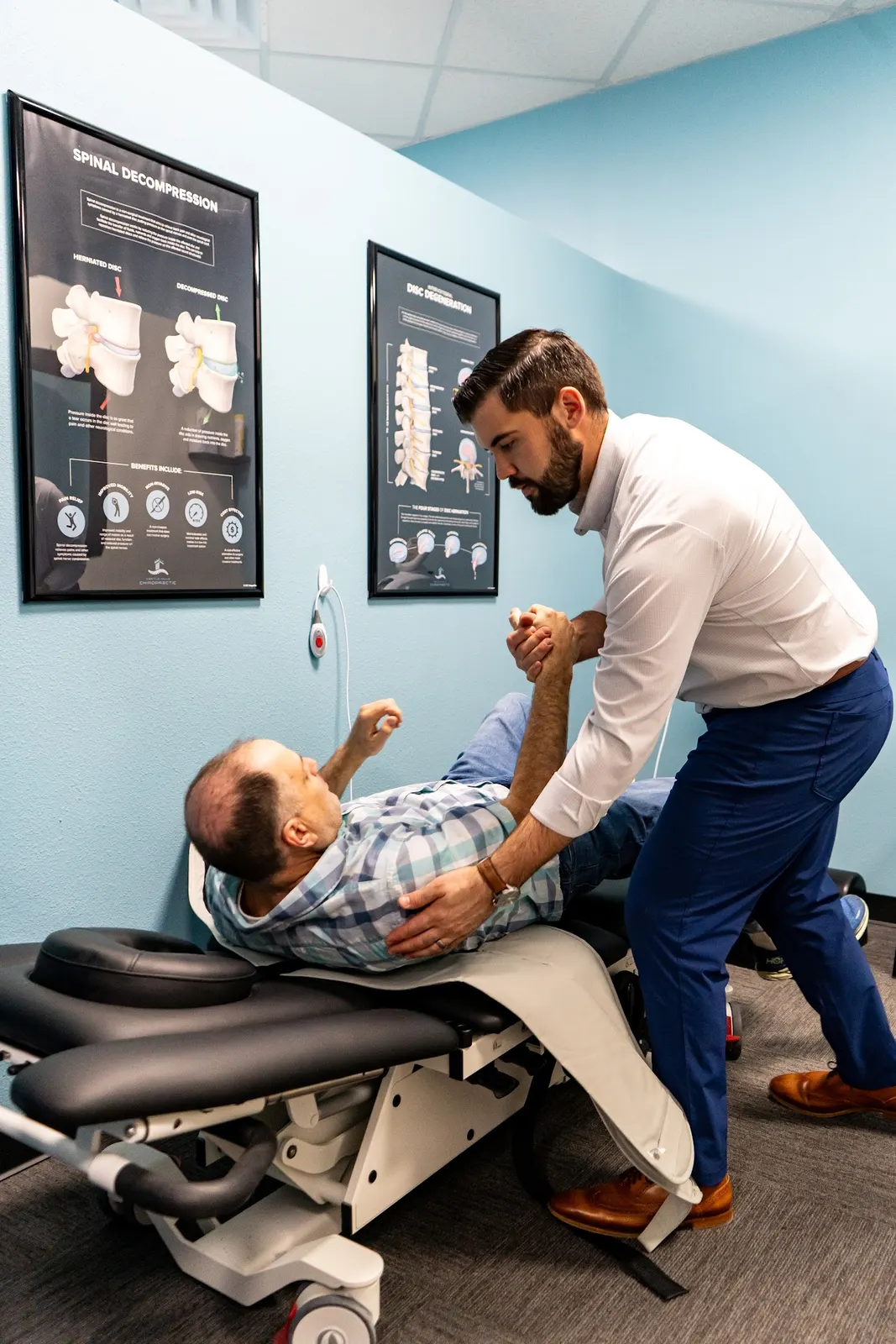 Dr. Brent Johnson giving a side-lying adjustment for hip pain
