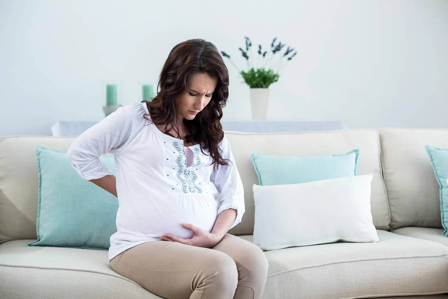 a woman suffering a back from her pregnancy