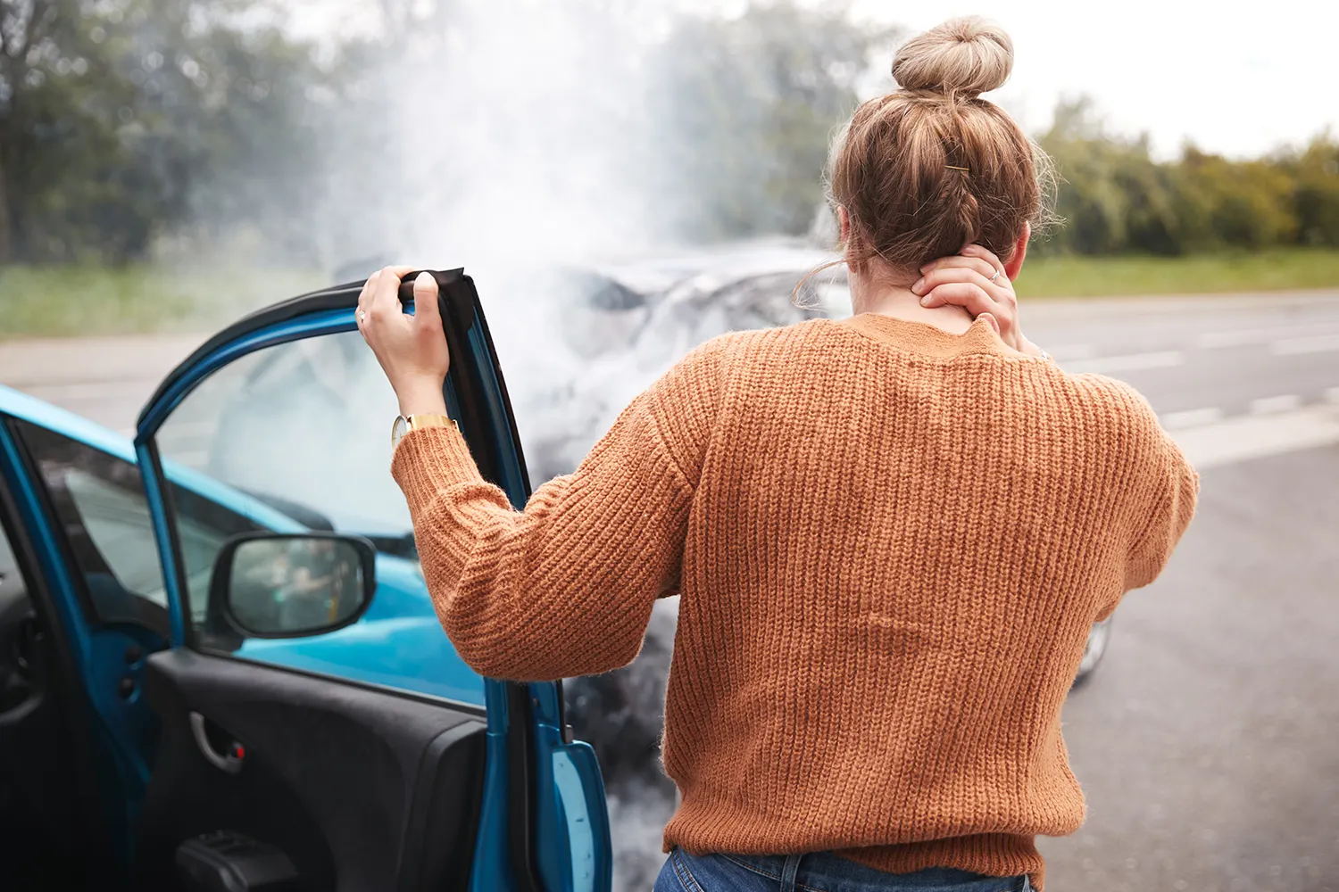 a woman having a whiplash