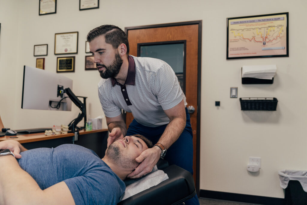 Dr Brent Johnson giving Migraine massage